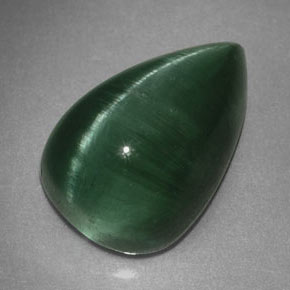 Cat's Eye Tourmaline طبيعي بلون أخضر عميق، وزن ‎2.46‎ قيراط، شكل شفاف، مقاس ‎10x6.5‎ مم
