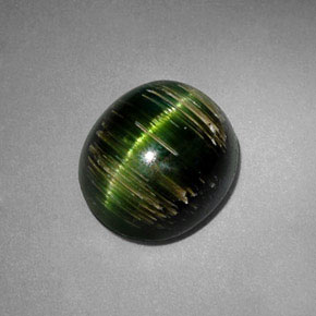 Cat's Eye Tourmaline طبيعي بلون أخضر عميق، وزن ‎3.24‎ قيراط، شكل بيضاوى، مقاس ‎9.2x8.2‎ مم