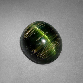 Cat's Eye Tourmaline طبيعي بلون أخضر عميق، وزن ‎3.24‎ قيراط، شكل بيضاوى، مقاس ‎9.2x8.2‎ مم
