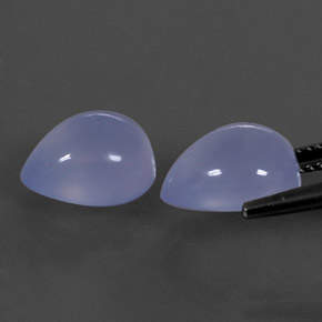 أحجار عقيق أبيض أو كالسيدونى أزرق خزامى طبيعية، شفاف، شفاف / نصف شفاف، وزنها  قيراط