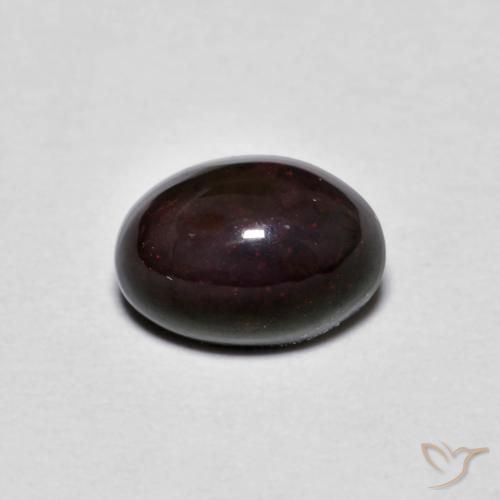 0.61ct طبيعي بني غامق شوكولاتة أوبال, بيضوي, غير شفاف