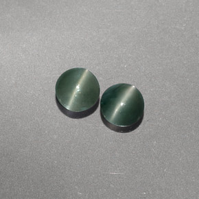 Chrysoberyl Cat's Eye طبيعي بلون أخضر، وزن ‎‎ قيراط، شكل شفاف، مقاس ‎3.81‎ مم