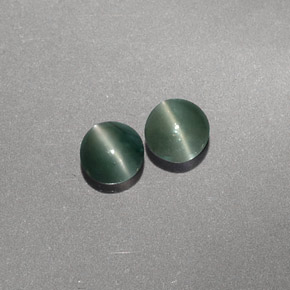 Chrysoberyl Cat's Eye طبيعي بلون أخضر، وزن ‎‎ قيراط، شكل شفاف، مقاس ‎3.81‎ مم
