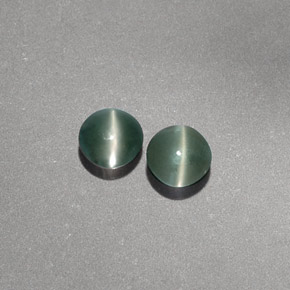 Chrysoberyl Cat's Eye طبيعي بلون أخضر، وزن ‎‎ قيراط، شكل شفاف، مقاس ‎3.81‎ مم