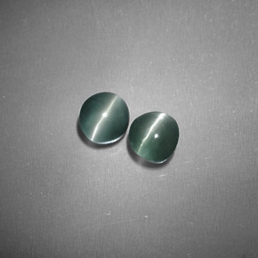 Chrysoberyl Cat's Eye طبيعي بلون أخضر، وزن ‎‎ قيراط، شكل دائري، مقاس ‎3.92‎ مم