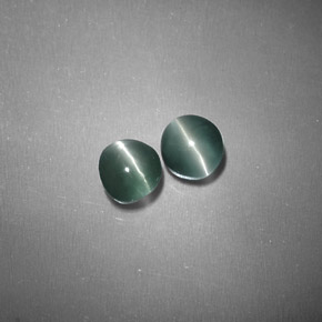 Chrysoberyl Cat's Eye طبيعي بلون أخضر، وزن ‎‎ قيراط، شكل دائري، مقاس ‎3.92‎ مم