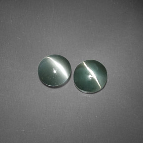 Chrysoberyl Cat's Eye طبيعي بلون أخضر، وزن ‎‎ قيراط، شكل شفاف، مقاس ‎4.49‎ مم