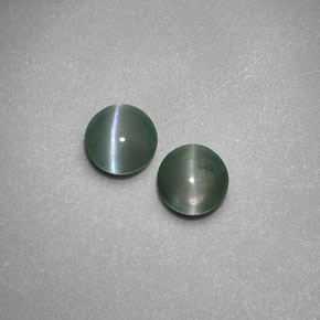 Chrysoberyl Cat's Eye طبيعي بلون أخضر، وزن ‎‎ قيراط، شكل شفاف، مقاس ‎3.91‎ مم