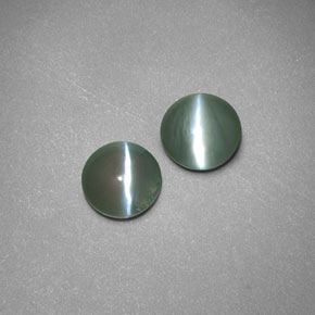 Chrysoberyl Cat's Eye طبيعي بلون أخضر، وزن ‎‎ قيراط، شكل شفاف، مقاس ‎4.40‎ مم