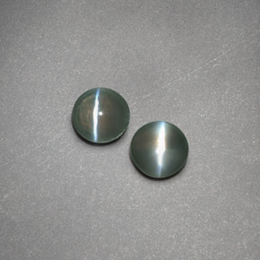 Chrysoberyl Cat's Eye طبيعي بلون أخضر، وزن ‎‎ قيراط، شكل شفاف، مقاس ‎3.94‎ مم