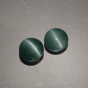 Chrysoberyl Cat's Eye طبيعي بلون أخضر، وزن ‎‎ قيراط، شكل دائري، مقاس ‎5.02‎ مم