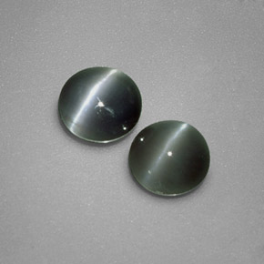 Chrysoberyl Cat's Eye طبيعي بلون أخضر، وزن ‎‎ قيراط، شكل دائري، مقاس ‎4.39‎ مم