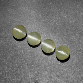 Chrysoberyl Cat's Eye طبيعي بلون أخضر مصفر، وزن ‎‎ قيراط، شكل شفاف، مقاس ‎3.85‎ مم