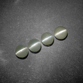 Chrysoberyl Cat's Eye طبيعي بلون أخضر، وزن ‎‎ قيراط، شكل شفاف، مقاس ‎3.94‎ مم
