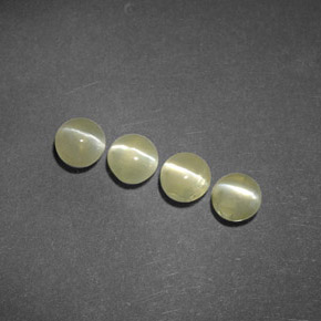 Chrysoberyl Cat's Eye طبيعي بلون أخضر ذهبي، وزن ‎‎ قيراط، شكل شفاف، مقاس ‎4.04‎ مم