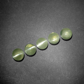 Chrysoberyl Cat's Eye طبيعي بلون أخضر ذهبي، وزن ‎‎ قيراط، شكل شفاف، مقاس ‎3.97‎ مم