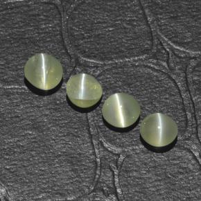Chrysoberyl Cat's Eye طبيعي بلون أخضر ذهبي، وزن ‎1.48‎ قيراط، شكل دائري، مقاس ‎3.93‎ مم