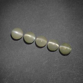 Chrysoberyl Cat's Eye طبيعي بلون أخضر ذهبي، وزن ‎‎ قيراط، شكل شفاف، مقاس ‎3.90‎ مم