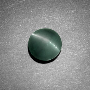 Chrysoberyl Cat's Eye طبيعي بلون أخضر، وزن ‎1.08‎ قيراط، شكل دائري، مقاس ‎5.97‎ مم
