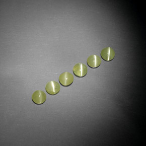 Chrysoberyl Cat's Eye طبيعي بلون أخضر مصفر، وزن ‎‎ قيراط، شكل شفاف، مقاس ‎3.79‎ مم