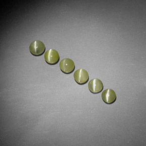 Chrysoberyl Cat's Eye طبيعي بلون ذهبي، وزن ‎‎ قيراط، شكل شفاف، مقاس ‎4.04‎ مم
