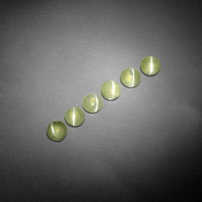 أحجار عين القط كريزوبيريل أخضر مصفر طبيعية، شفاف، شفاف / نصف شفاف، وزنها  قيراط