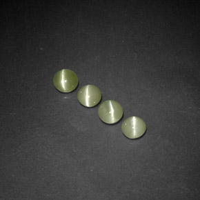 Chrysoberyl Cat's Eye طبيعي بلون أخضر مصفر، وزن ‎‎ قيراط، شكل شفاف، مقاس ‎3.82‎ مم