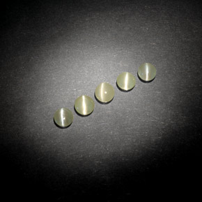 أحجار عين القط كريزوبيريل أخضر مصفر طبيعية، شفاف، شفاف / نصف شفاف، وزنها  قيراط