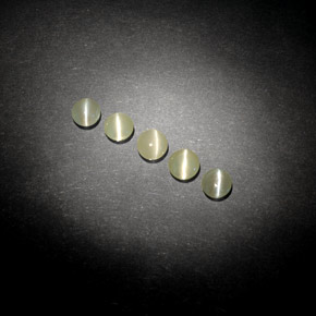 أحجار عين القط كريزوبيريل أخضر مصفر طبيعية، شفاف، شفاف / نصف شفاف، وزنها  قيراط