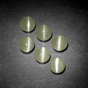 Chrysoberyl Cat's Eye طبيعي بلون أخضر مصفر، وزن ‎‎ قيراط، شكل شفاف، مقاس ‎4.02‎ مم