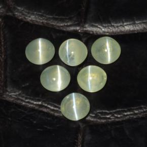 Chrysoberyl Cat's Eye طبيعي بلون أخضر مصفر، وزن ‎2.00‎ قيراط، شكل دائري، مقاس ‎3.94‎ مم