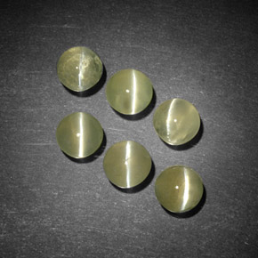 Chrysoberyl Cat's Eye طبيعي بلون ذهبي، وزن ‎‎ قيراط، شكل شفاف، مقاس ‎4.14‎ مم