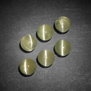 Chrysoberyl Cat's Eye طبيعي بلون ذهبي، وزن ‎‎ قيراط، شكل شفاف، مقاس ‎4.14‎ مم