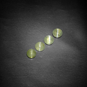 Chrysoberyl Cat's Eye طبيعي بلون أخضر مصفر، وزن ‎‎ قيراط، شكل شفاف، مقاس ‎3.85‎ مم