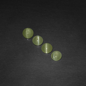 Chrysoberyl Cat's Eye طبيعي بلون أخضر مصفر، وزن ‎‎ قيراط، شكل شفاف، مقاس ‎3.92‎ مم