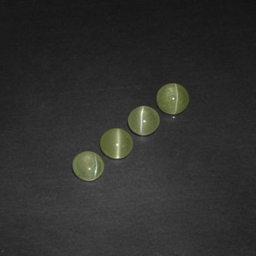 Chrysoberyl Cat's Eye طبيعي بلون أخضر مصفر، وزن ‎‎ قيراط، شكل شفاف، مقاس ‎3.92‎ مم