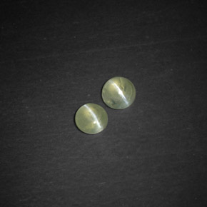 Chrysoberyl Cat's Eye طبيعي بلون أخضر مصفر، وزن ‎‎ قيراط، شكل شفاف، مقاس ‎3.52‎ مم