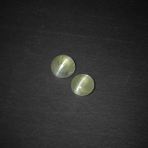 Chrysoberyl Cat's Eye طبيعي بلون أخضر مصفر، وزن ‎‎ قيراط، شكل شفاف، مقاس ‎3.52‎ مم