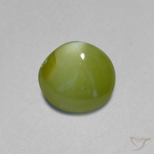 Chrysoberyl Cat's Eye طبيعي بلون أخضر زيتوني، وزن ‎0.89‎ قيراط، شكل بيضاوى، مقاس ‎5.7x5.3‎ مم