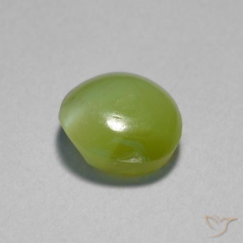 Chrysoberyl Cat's Eye طبيعي بلون أخضر زيتوني، وزن ‎0.89‎ قيراط، شكل بيضاوى، مقاس ‎5.7x5.3‎ مم