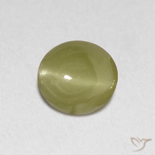 Chrysoberyl Cat's Eye طبيعي بلون أصفر رقيق، وزن ‎0.40‎ قيراط، شكل بيضاوى، مقاس ‎4.2x4‎ مم