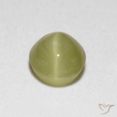 Chrysoberyl Cat's Eye طبيعي بلون أصفر رقيق، وزن ‎0.40‎ قيراط، شكل بيضاوى، مقاس ‎4.2x4‎ مم