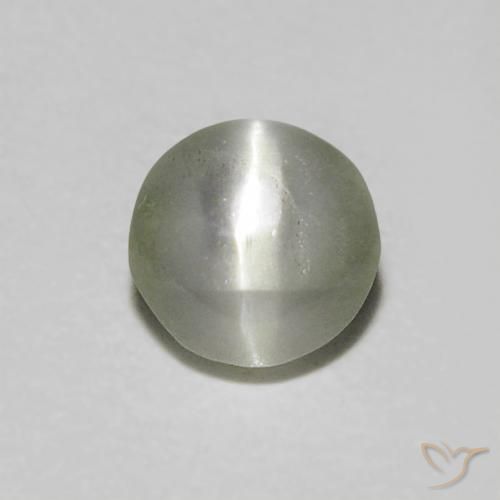 Chrysoberyl Cat's Eye طبيعي بلون رمادى متوسط، وزن ‎0.47‎ قيراط، شكل بيضاوى، مقاس ‎4.3x4.2‎ مم
