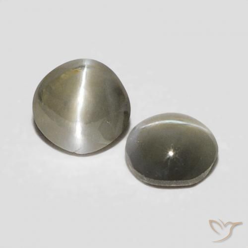 أحجار عين القط كريزوبيريل رمادى فاتح جدا طبيعية، بيضوي، غير شفاف، وزنها 0.38 قيراط