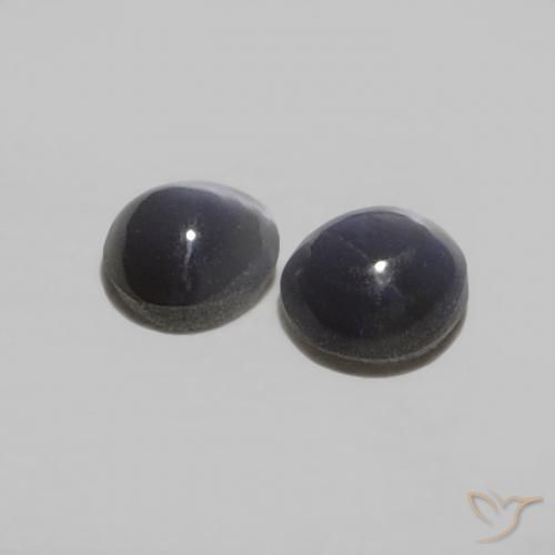 أحجار عين القط كريزوبيريل رمادي غامق طبيعية، بيضوي، غير شفاف، وزنها 0.38 قيراط