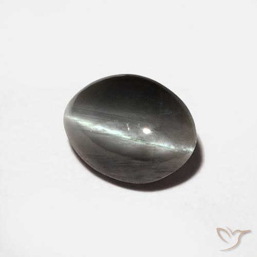 Chrysoberyl Cat's Eye طبيعي بلون رمادى متوسط، وزن ‎0.88‎ قيراط، شكل بيضاوى، مقاس ‎6.7x5‎ مم