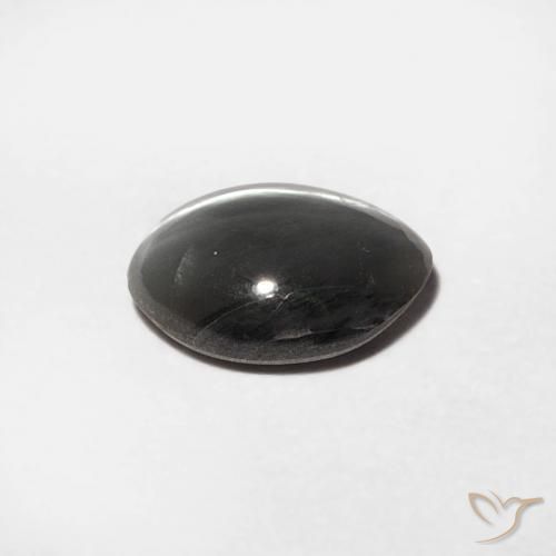 Chrysoberyl Cat's Eye طبيعي بلون رمادى متوسط، وزن ‎0.88‎ قيراط، شكل بيضاوى، مقاس ‎6.7x5‎ مم