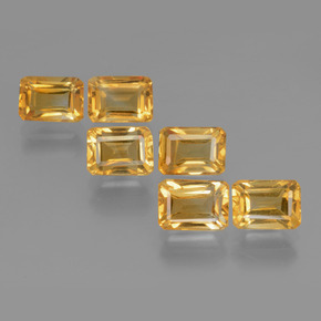 سيترين طبيعي بلون Orange-Gold ، وزن ‎6.92‎ قيراط، شكل قص الزمرد، مقاس ‎7.1x5.1‎ مم