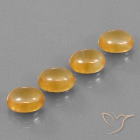 أحجار سيترين Medium-Light Orange-Gold  طبيعية، بيضوي، شفاف، وزنها 12.11 قيراط