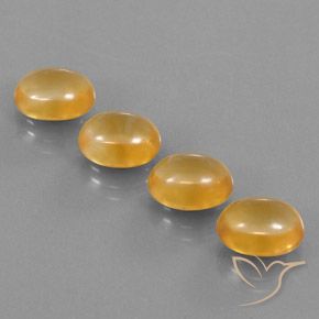 أحجار سيترين Medium-Light Orange-Gold  طبيعية، بيضوي، شفاف، وزنها 12.11 قيراط